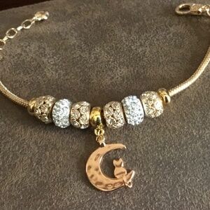 Gold Bracelet with Charm